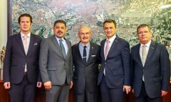 Yılmaz Büyükerşen'e hizmet övgüsü