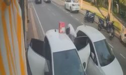 Otomobilden malzeme indiren market çalışanına araba çarptı