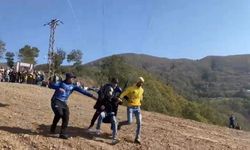 Renkli festivalde paraşütçü kayaya çarptı!