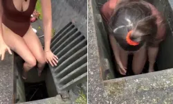 Bir an bile düşünmeden kanalizasyona atladı