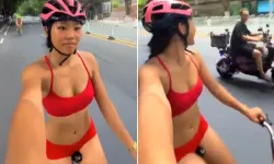 Kırmızı bikinisiyle trafiğe çıktı, 5 kazaya neden oldu