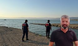 Oğlunu kurtarmak isterken canından oldu