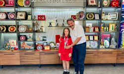 Elif Ertek'ten çifte gurur